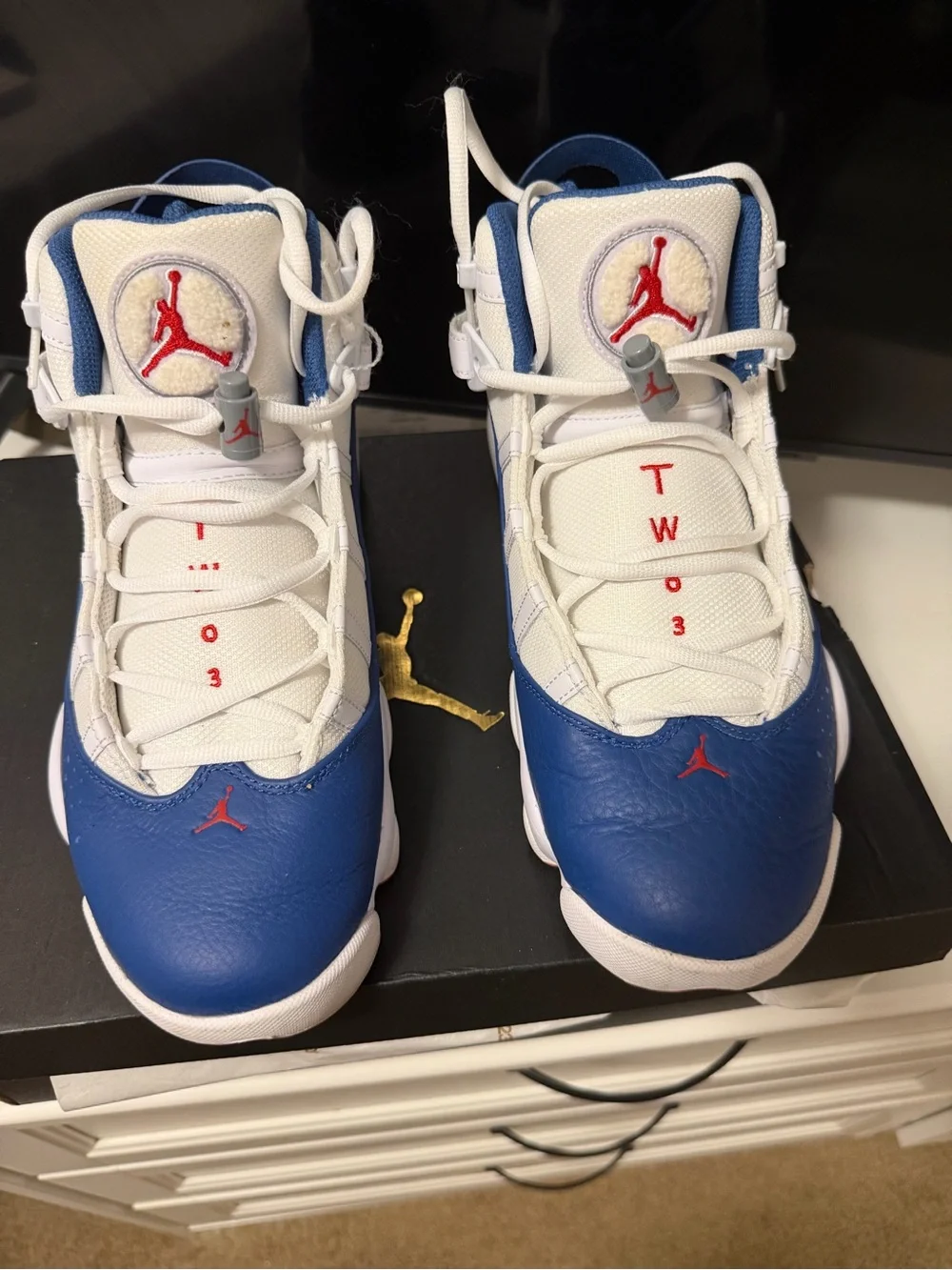 Jordan men’s White, Blue & Red Retro Basketball Sneakers worn twice like new